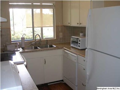 Kitchen has lots of cabinet space, new dishwasher 
