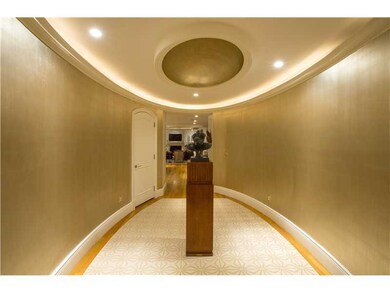 Entry. Stunning grand foyer with gold leafed paint