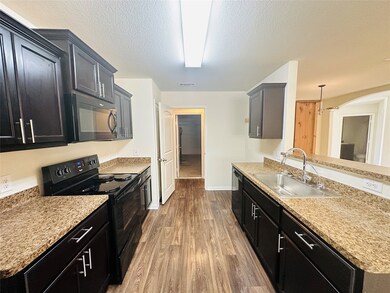 10558 Logger Pine Trail, Houston, TX 77088 - photo 2