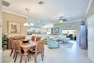 Dining room featuring light tile patterned floors,