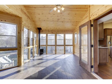 4 season porch with heated floor and fireplace
