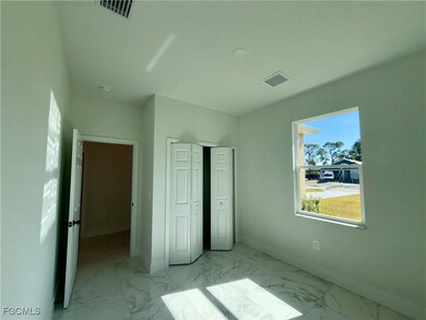 263 Grant Blvd, Lehigh Acres, FL 33974 - photo 5