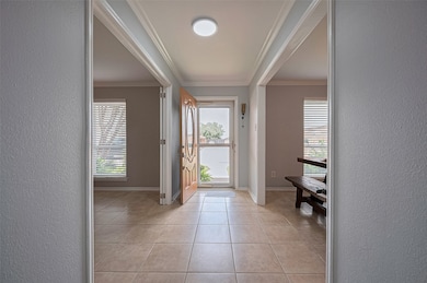 Bright and airy hallway painted in soft, neutral t