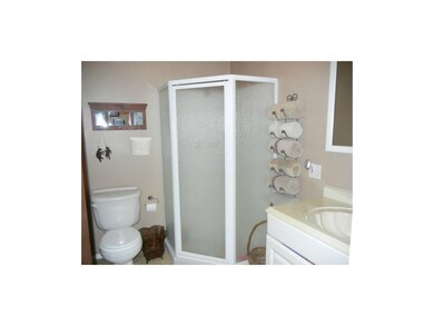 Updated hall bath with corner shower
