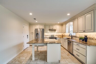 Inviting Kitchen with Tons of Cabinets and Drawers