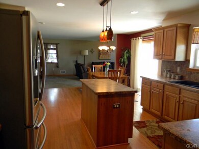Kitchen View across Informal Dining through Family
