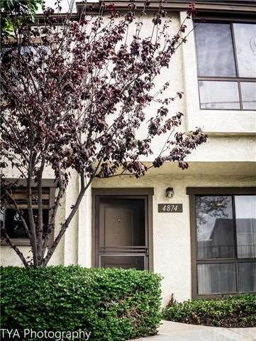 Unit entrance with well maintained landscape