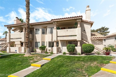 View of front of property featuring stairway, a ch