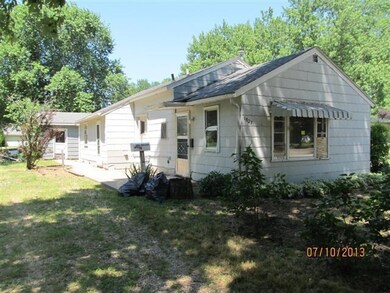 Side of house with extra driveway