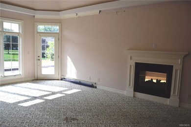 Master Bedroom with two sided fireplace and door t