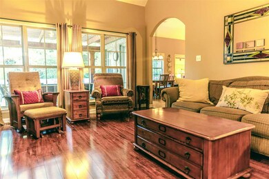 When you open the double doors, you will be face with this glorious spacious living room with a fireplace.