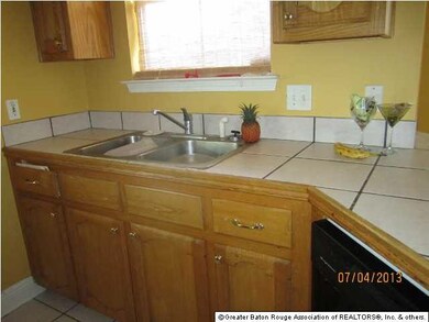 Kitchen has ample storage and a window view to out