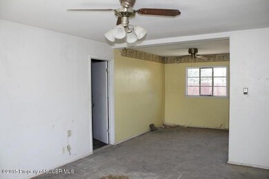 Living room view to dining