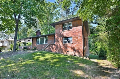 View of front of home featuring brick siding, craw