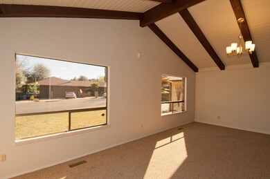 Living room with vaulted ceiling