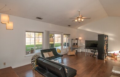 living room with vaulted ceilings