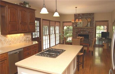 Updated tile, hardware, and gleaming hardwood floo