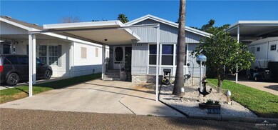 View of front of property with a carport