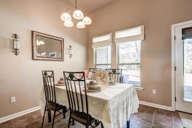 BREAKFAST AREA ADJACENT TO KITCHEN AND LIVING AREA