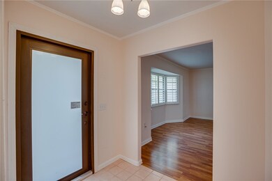 Foyer with high impact door