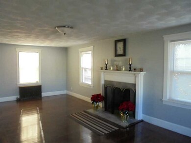 Living Room. beautiful fireplace all new tile.