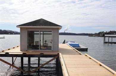 Enclosed sunroom on dock would make the perfect ar