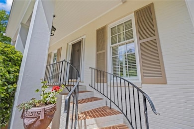 Property entrance featuring a porch