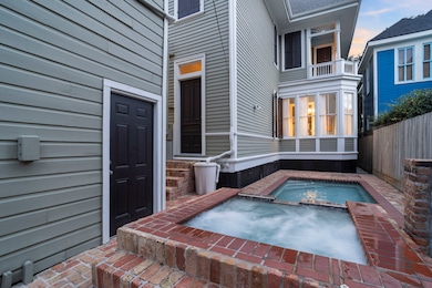 Charming brick courtyard with plunge pool and elev