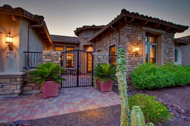 Gated courtyard to entrance.