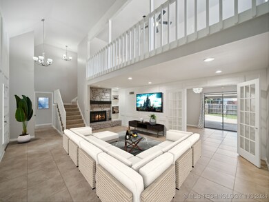 Cosey up next to the fireplace in this large famil