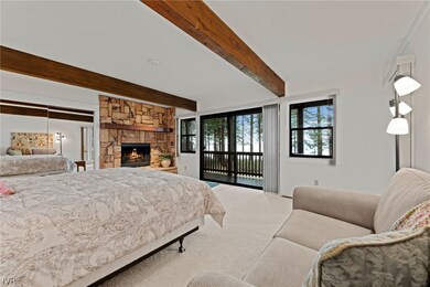 Lakeview bedroom with fireplace
