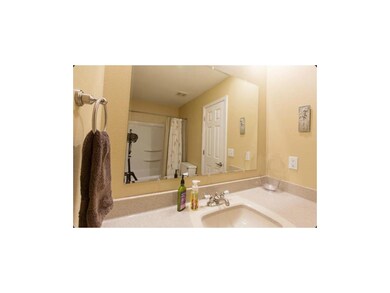 Hall bath with updated counters, paint, & fixtures