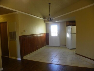 Spare room with ornamental molding, a notable chan