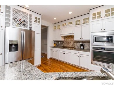 Granite Counters, SS Appl., Hardwood Floors, Backs