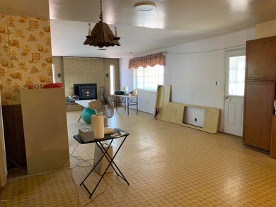 Family room & fireplace from kitchen JPG