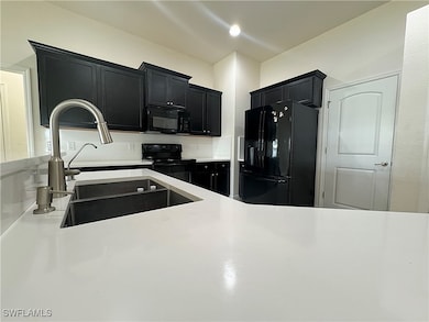 2103 NE 4th Place, Cape Coral, FL 33909 - photo 7