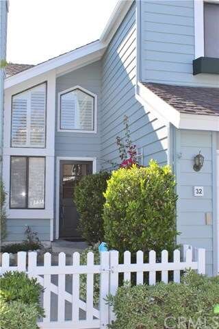 Enter through white picket fence