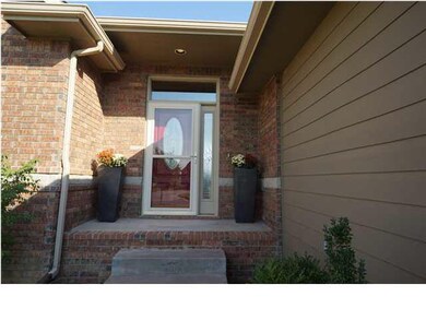 The beautiful red door is a welcoming touch! Lovel