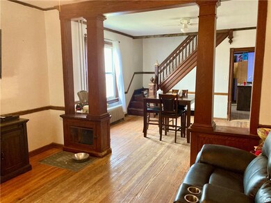 Living room view looking into dining room