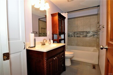 Full Bath with custom tile work.