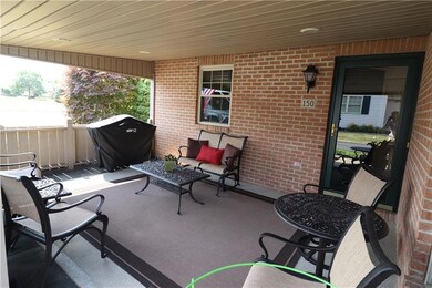 Nice COVERED PATIO has plenty of room for BBQ gril