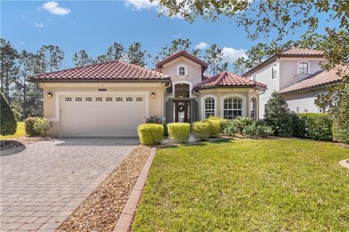 Lovely paver driveway with professional landscaped
