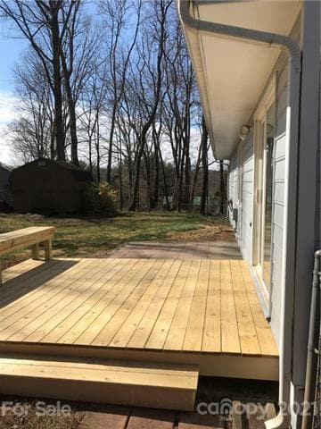 Back porch with a hot tub pad with electrical in place already