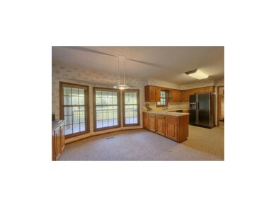 Kitchen and breakfast room w/ great views.