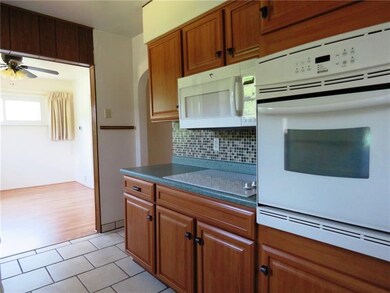 Kitchen view into dining room.  Also shown are the