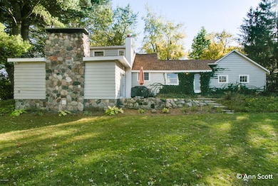 6945 Pine Island Dr NE, Comstock Park, MI 49321 - photo 4