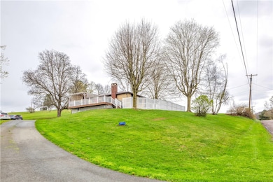 View from Street.  Privacy Fence surrounds the fro