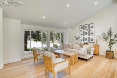 Formal living room space serves as the perfect, qu