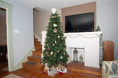 living room with fireplace and entrance to the 2nd