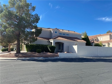 Mediterranean / spanish-style home with stucco siding and a tile roof